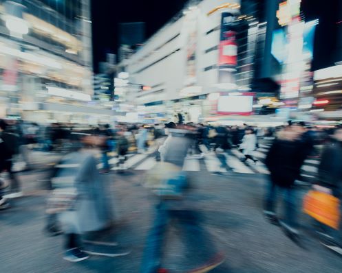 night time scene of people in motion