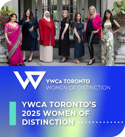 Women of Distinction Awards - seven women standing in front of glass doors.